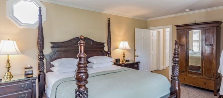 Fireside Room — massive king four-poster bed